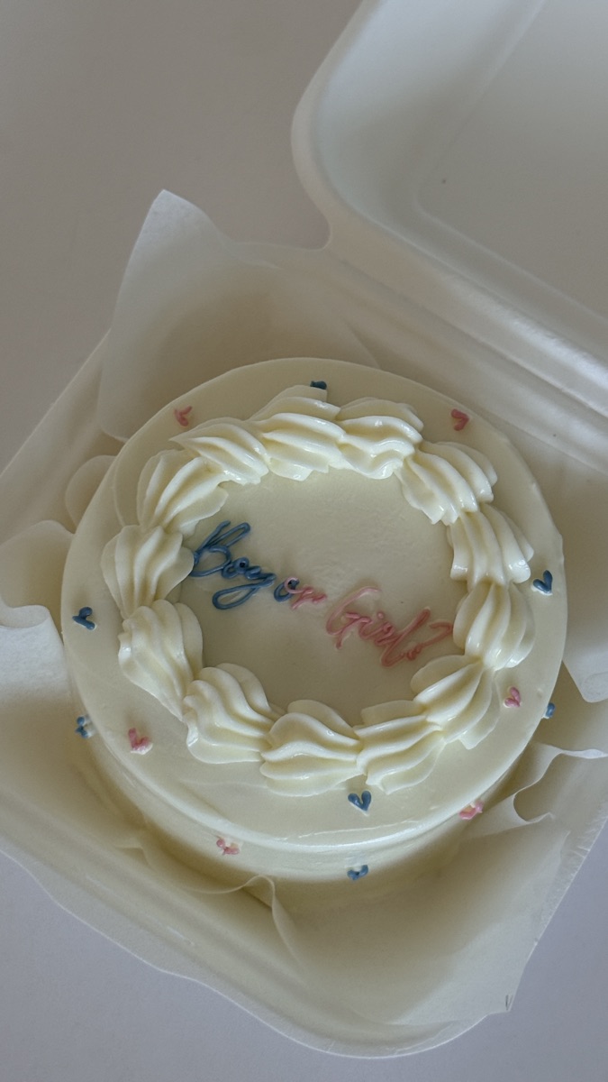 Gender reveal bento cake with “Boy or Girl?” piping in a bento box